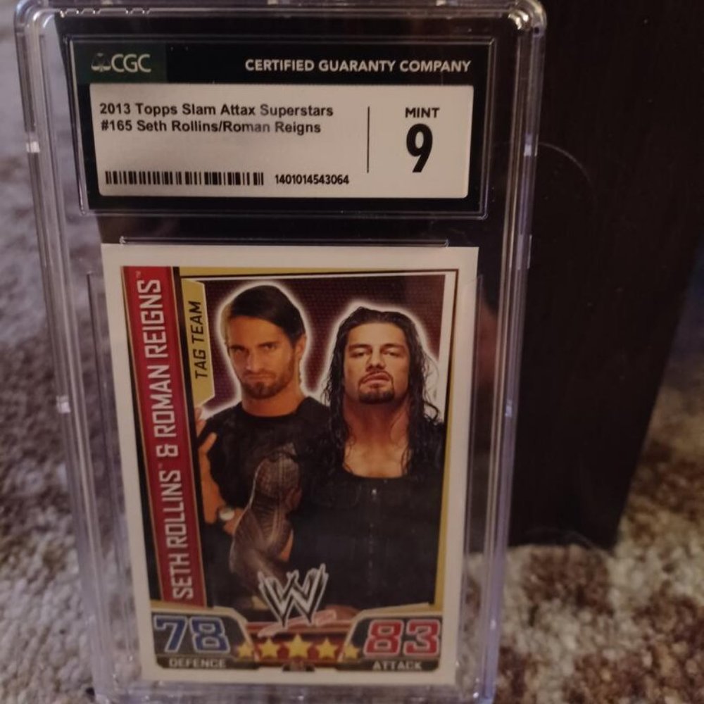 ROMAN REIGNS & SETH ROLLINS 2013 TOPPS WWE SLAM ATTAX GRADED CGC 9 RC #165 CARD